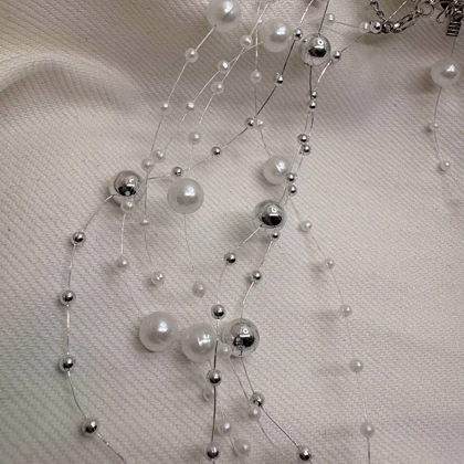 گردنبند نامرئی طرح «مروارید معلق» (Illusion Necklace) | مینیمال و اقتصادی