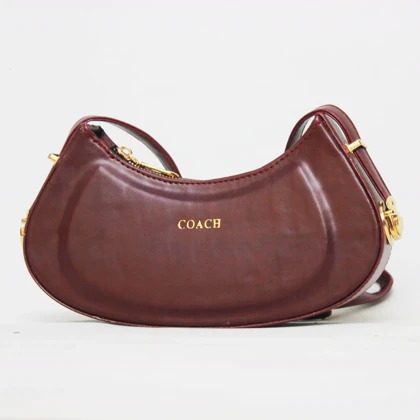 کیف دوشی زنانه coach رنگ زرشکی