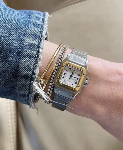 ساعت کارتیر سانتوس فلزی زنانه دورنگ طلایی صفحه سفید Cartier Santos metal
