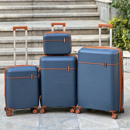 چمدان نشکن تیتان پلورا مدل TITANPLORA - TP6600SERIES Universal Travelle سری 4 عددی (کیف آرایشی هدیه)