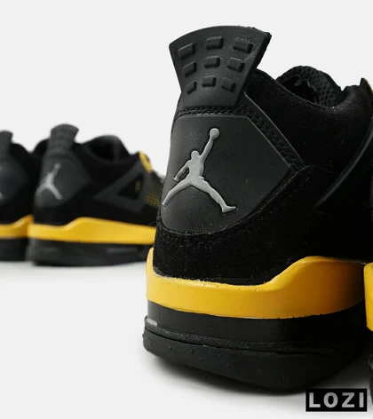 کفش کتانی ساق‌دار مردانه مشکی زرد Nike air jordan 4