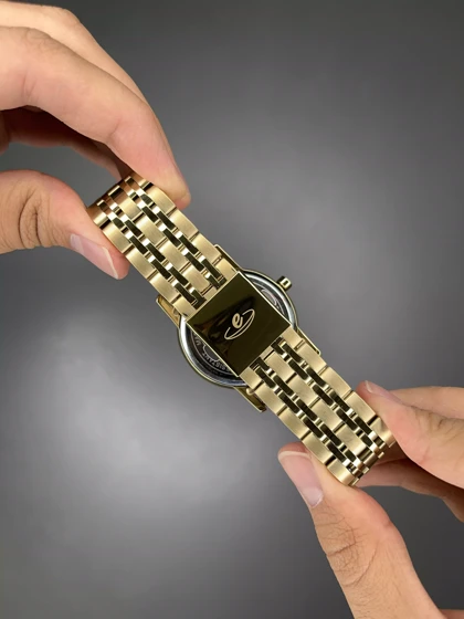 ساعت مچی الگانس بند طلایی صفحه سفید Elegance