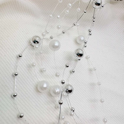 گردنبند نامرئی طرح «مروارید معلق» (Illusion Necklace) | مینیمال و اقتصادی