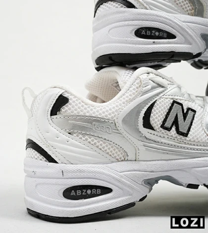 کفش کتانی مردانه و زنانه سفید طوسی NEW BALANCE 530