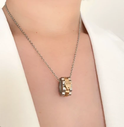 نیمست رولکس استیل طلایی نقره ای (گردنبند وگوشواره) Rolex steel necklace and earrings
