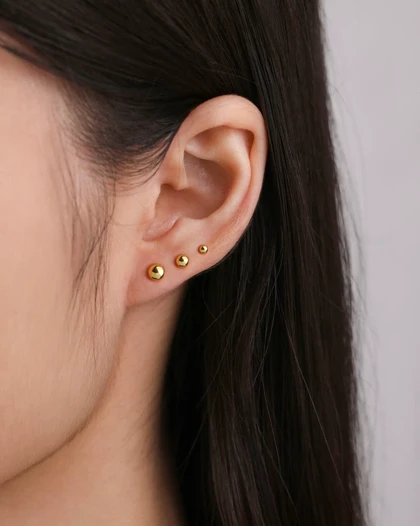 پک گوشواره گوی طلایی برند ژوپینگ مناسب برای سه سوراخ روی گوش