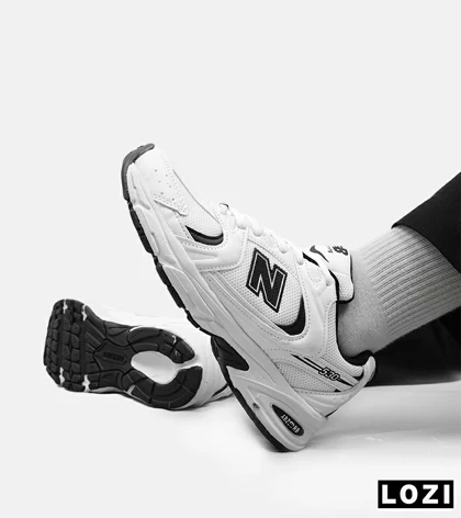 کفش کتانی مردانه و زنانه سفید مشکی NEW BALANCE 530 مدل 4974