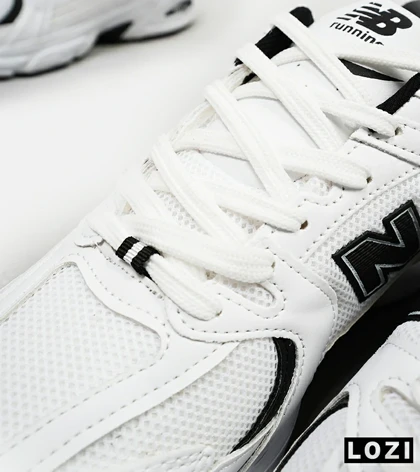 کفش کتانی مردانه و زنانه سفید مشکی NEW BALANCE 530 مدل 4974