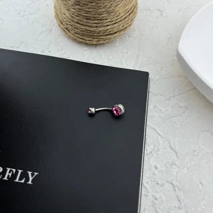 پیرسینگ ناف نگین‌دار اکلیلی