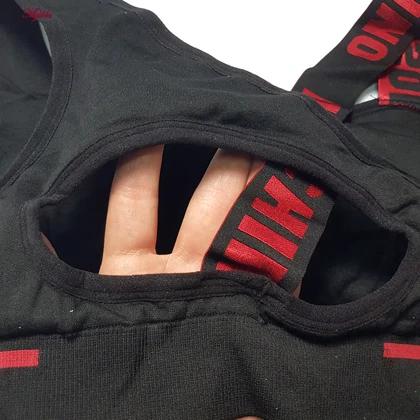 ست نیم‌تنه و شلوارک ورزشی زنانه مدل سیملس پشت چین‌دار کد 5562-2333