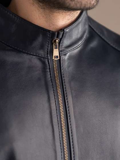 کاپشن چرم طبیعی سرمه ای ساده j195