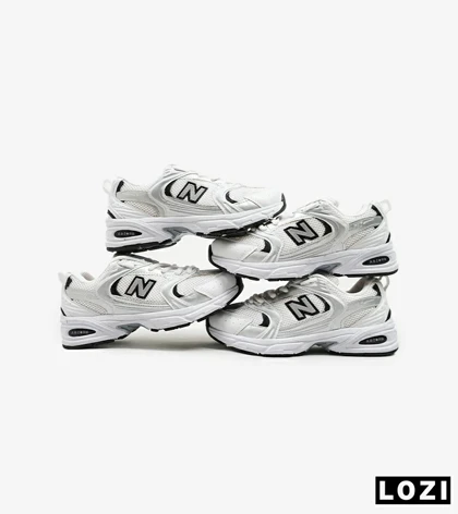 کفش کتانی مردانه و زنانه سفید طوسی NEW BALANCE 530