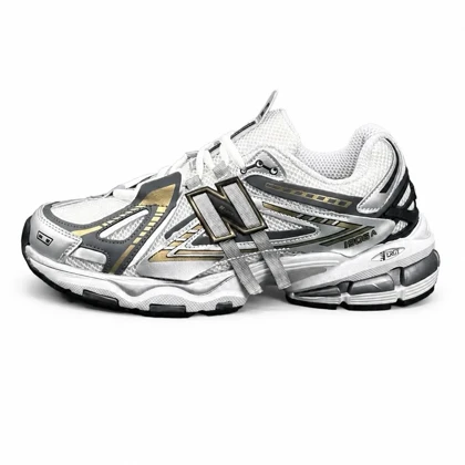 کتانی مردانه نیوبالانس 1906 طوسی مشکی طلایی New BALANCE 1906A