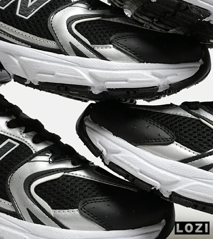 کفش کتانی مردانه و زنانه مشکی نقره ای NEW BALANCE 530