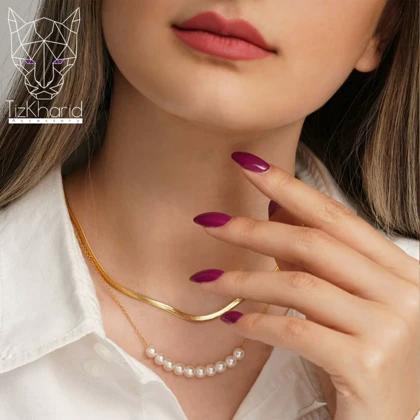 گردنبند پوست ماری و مروارید دو لاین استیل