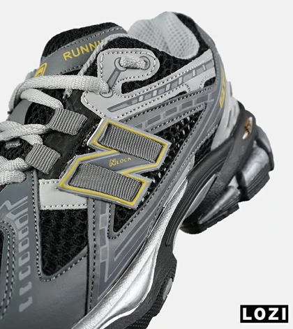 کفش کتانی مردانه و زنانه طوسی مشکی New Balance 1906R مدل 7547