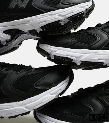 کفش کتانی مردانه و زنانه مشکی NEW BALANCE 530