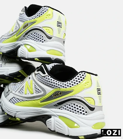 کفش کتانی مردانه و زنانه سفید لیمویی NEW BALANCE 1064 V.2