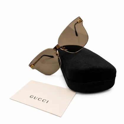عینک آفتابی زنانه Gucci Rimless با فریم طلایی