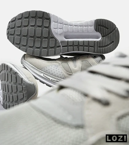 کفش کتانی طبی زنانه و مردانه طوسی سفید SKECHERS archfit v02