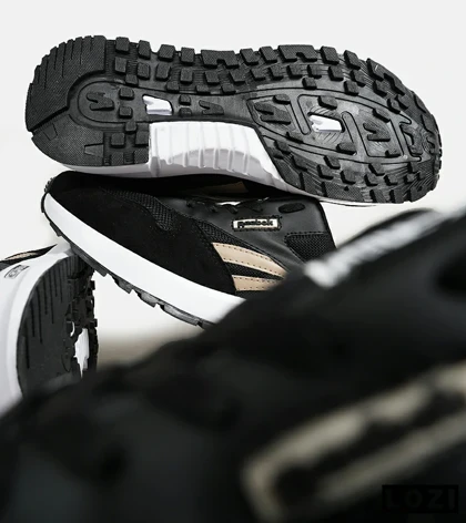 کفش کتانی مشکی کرم REEBOK Unphased Pro مدل 6332