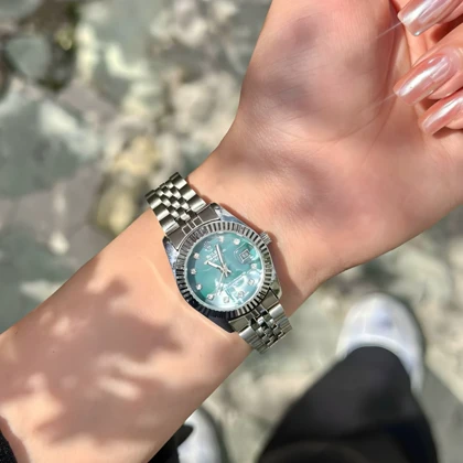 ساعت مچی زنانه رولکس مدل صفحه صدفی رنگ سبز آبی