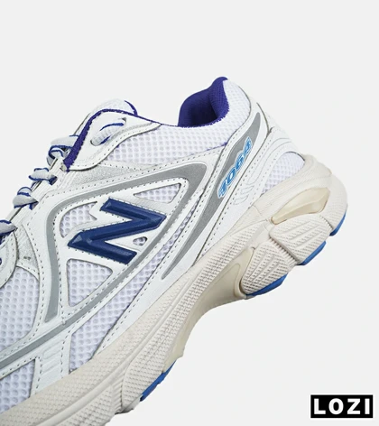 کفش کتانی مردانه و زنانه سفید سرمه ای NEW BALANCE 1064 V.2 مدل 8766