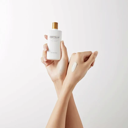 کرم ضد آفتاب رنگی اسکین 1004 SPF 50 مدل ایر فیت پلاس