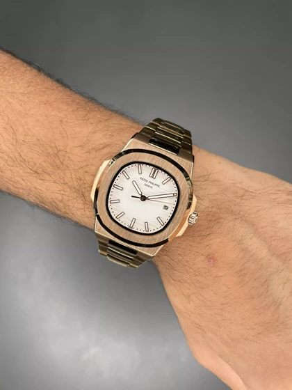 ساعت مچی پتک فیلیپ اتوماتیک بند فلزی رزگلد صفحه سفید Patek Philippe Nautilus