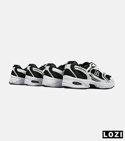 کفش کتانی بزرگ پا سفید مشکی NEW BALANCE 530 مدل 5139