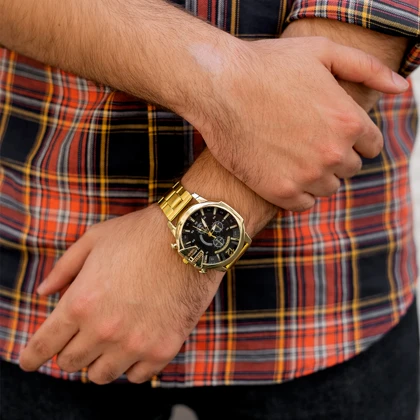 ساعت مچی DIESEL مردانه طلایی صفحه مشکی مدل U700 ویژه