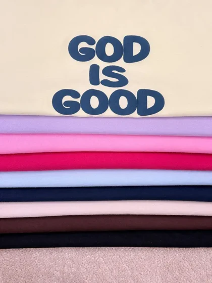 تیشرت اورسایز پنبه رنگی طرح GOD IS GOOD آلما