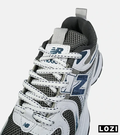 کفش کتانی مردانه و زنانه سفید طوسی آبی NEW BALANCE 990 مدل 8516