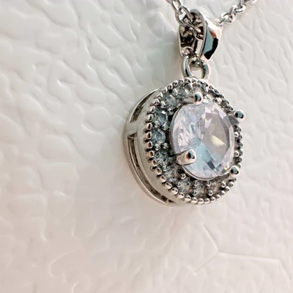 نیم‌ست استیل نقره‌ای طرح «خورشیدی گرد» (گردنبند + گوشواره) | اقتصادی و درخشان