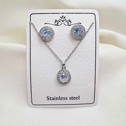 نیم‌ست استیل نقره‌ای طرح «خورشیدی گرد» (گردنبند + گوشواره) | اقتصادی و درخشان
