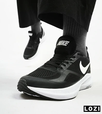 کفش کتانی بزرگ پا مشکی سفید Nike guide 10