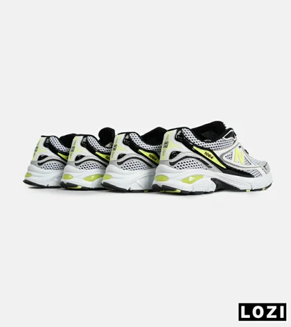کفش کتانی مردانه و زنانه سفید مشکی لیمویی NEW BALANCE 1064 V.2 مدل 7010