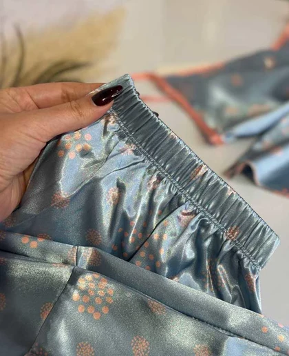 تاب و شلوار ساتن زنانه کد4-9517 طرح قاصدک