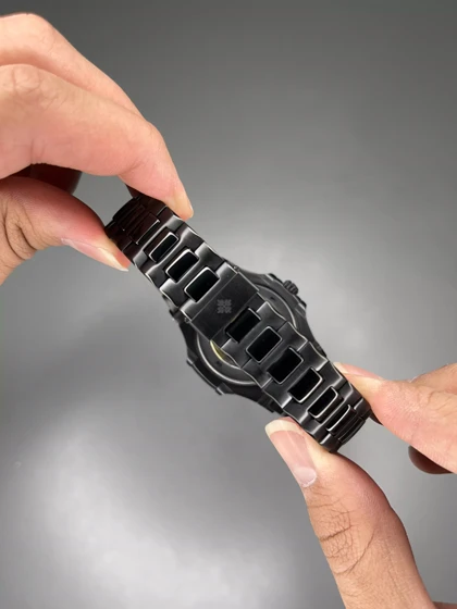 ساعت مچی پتک فیلیپ بدنه مشکی صفحه سرمه ای Patek Philippe Nautilus