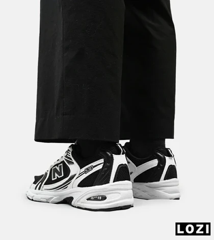 کفش کتانی مردانه و زنانه سفید مشکی NEW BALANCE 530