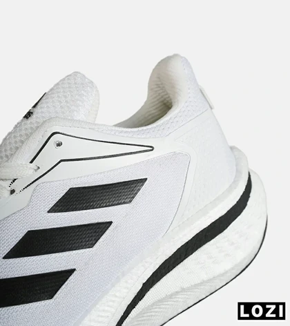 کفش کتانی مردانه و زنانه سفید مشکی Adidas Quester Tnd مدل 7809