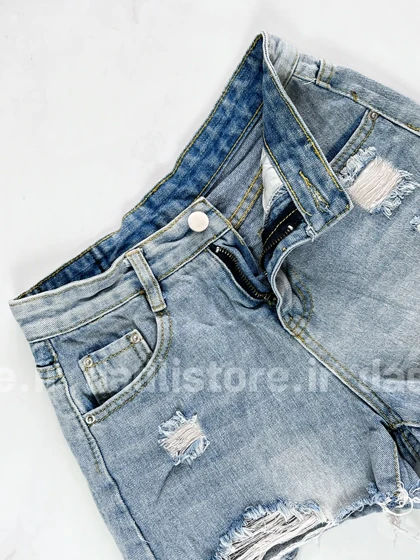 شورتک کوتاه جین زاپ‌دار پاچه ریش دار