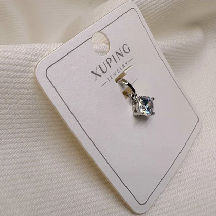 پلاک ژوپینگ طرح «سولیتر» (تک نگین) | درخشش الماس در قابی نقره‌ای