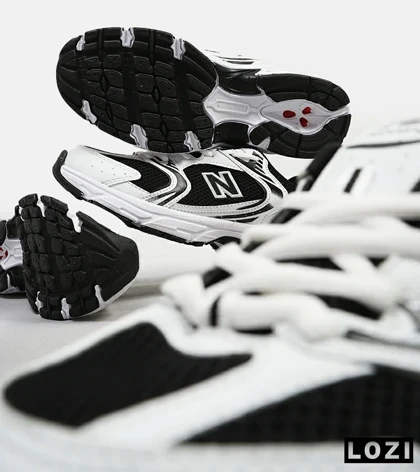 کفش کتانی مردانه و زنانه سفید مشکی NEW BALANCE 530