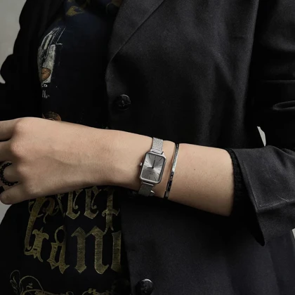 ساعت دنیل ولینگتون حصیری زنانه نقره ای صفحه مستطیل سیلور Daniel Wellington Silver