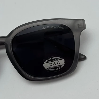 عینک آفتابی پلاریزه دولچه گابانا DOLCE GABBANA دسته سیم کشی شده لولا فنر طوسی کد 7709