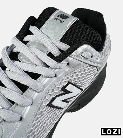 کفش کتانی مردانه و زنانه طوسی مشکی New Balance 509 مدل 7533