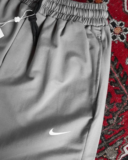 شلوار اسلش دو نخ برند نایکی در رنگ بندی Baggy Pants Nike brand