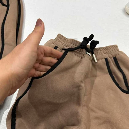 شلوار جاگر دورس لاینردار طرح MM لبخند