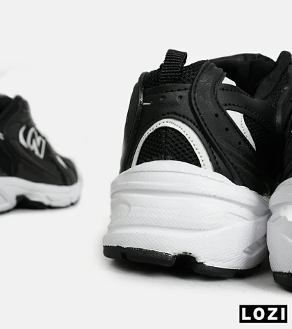 کفش کتانی مردانه و زنانه مشکی NEW BALANCE 530